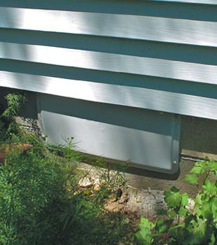 A gray crawl space vent cover in Westfield