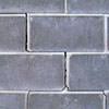 A diagonal stair-step crack found along a foundation wall in a Plainfield home