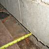 Foundation wall separating from the floor in Seymour home