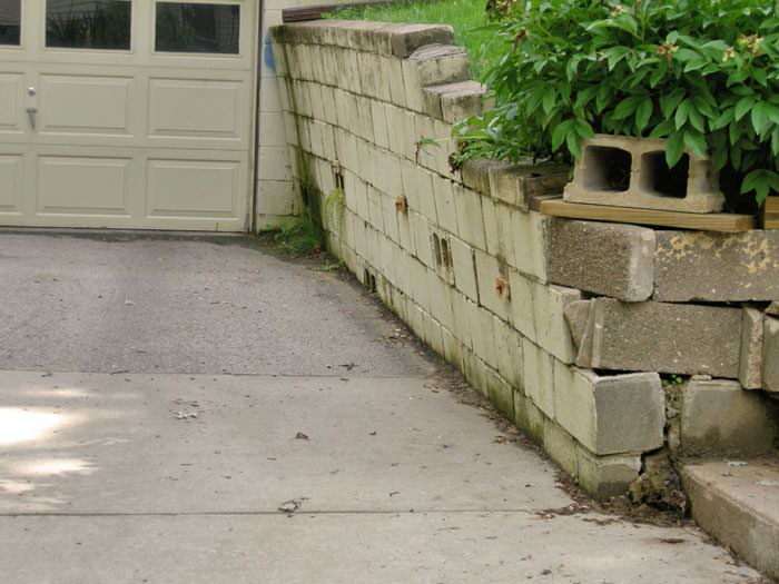 a failing retaining wall around a driveway in Indianapolis