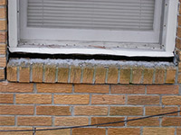 A window sill cracking and separating from the foundation wall in a Brownsburg home.