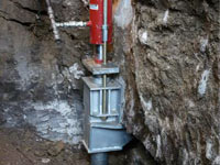 Foundation repair contractors lifting a structure in Carmel.