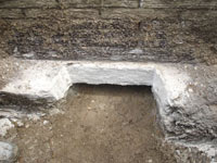 Preparing a foundation footing for helical pier installation in Lafayette