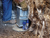 Securing a foundation footing bracket for a foundation repair system in Zionsville.