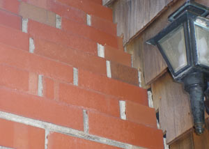 a repaired chimney in Westfield that had shown serious foundation damage and was repaired with a helical pier system.