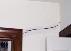 A large drywall crack in an interior wall in Muncie
