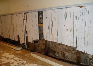 A wet, flooded finished basement in Brownsburg
