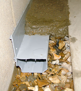 A basement drain system installed in a Muncie home