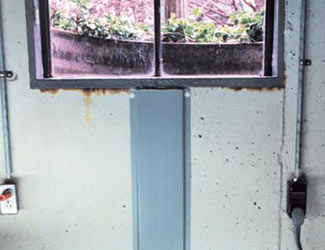 Repaired waterproofed basement window leak in Bloomington